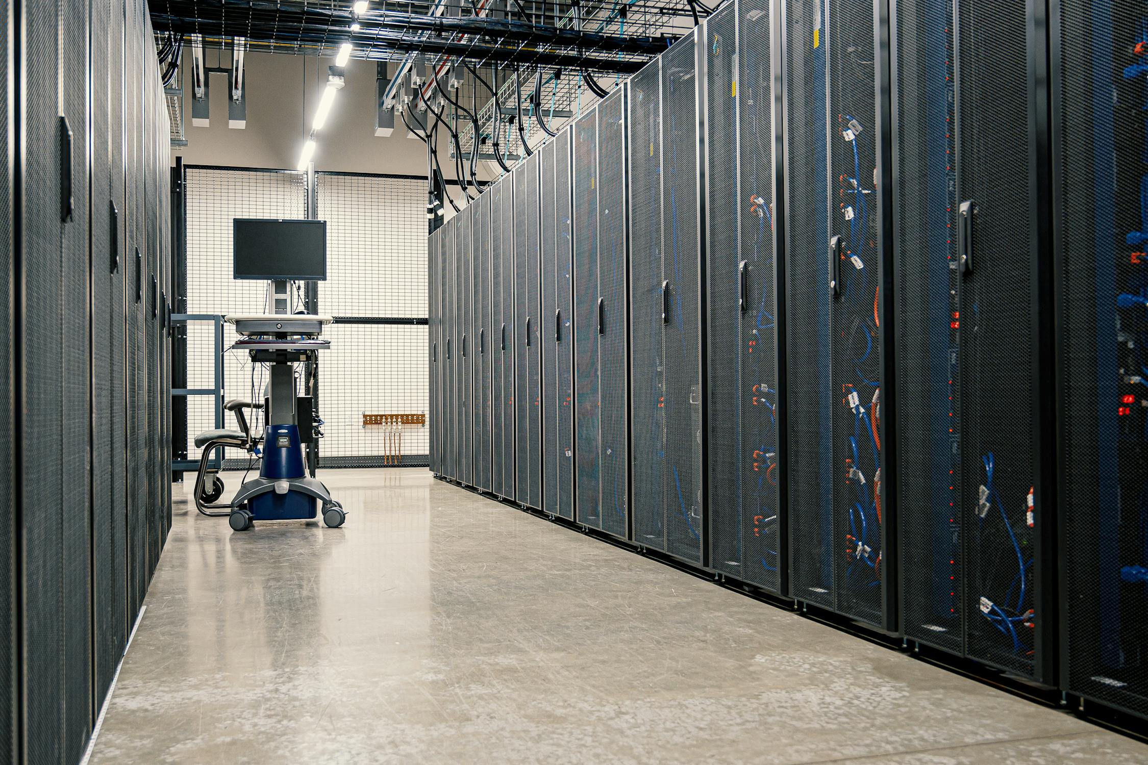 Server racks in a modern data centre corridor