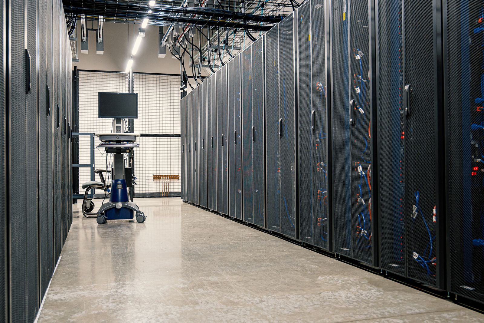 Server cabinet with networking devices and cables, a homelab for learning identity governance