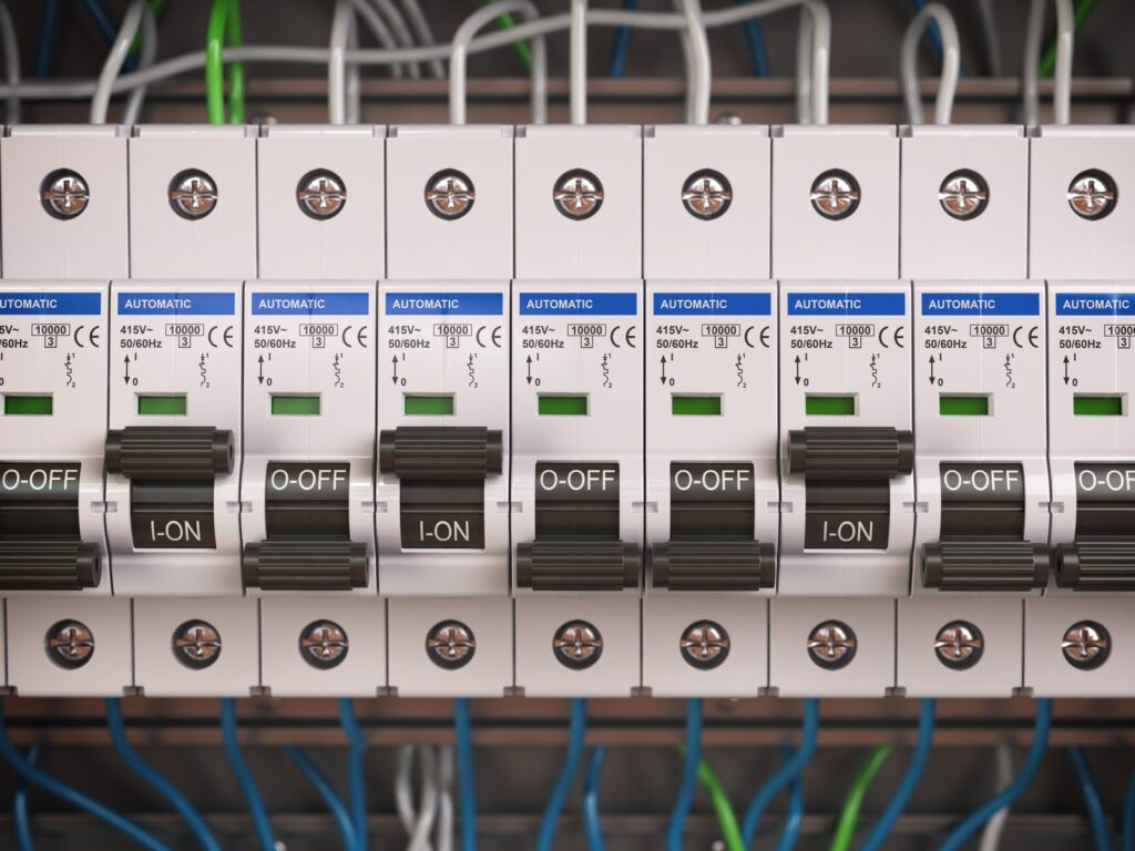 Circuit breaker panel with wires, most switches off - capability wired but not switched on